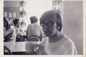 man with large glasses in the 1960s